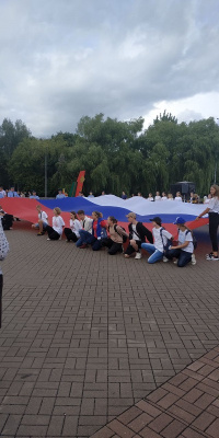 Сотрудники департамента и подведомственных организаций приняли участие в праздновании Дня Государственного флага России